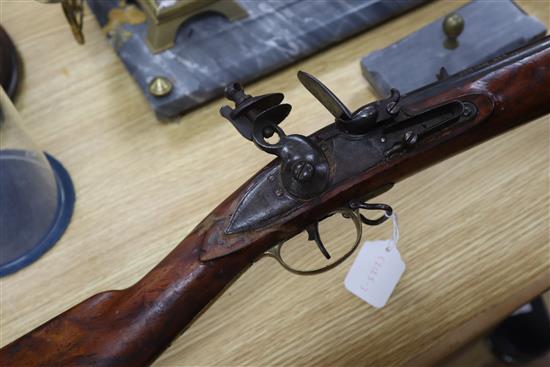 A 19th century Brown Bess-type flintlock musket, Jaipur Armoury, stamped JPR/EXR/ 336 length 142cm, restoration to stock